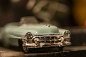 toy model of a beautiful vintage car with a chrome bumper photo