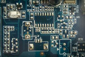 resistors on the blue printed circuit board. pcb photo