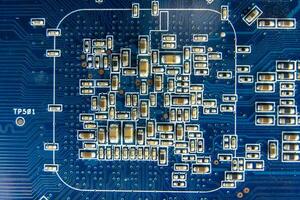 resistors on the blue printed circuit board. pcb photo