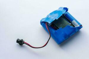 broken lithium battery pack with wires and a terminal photo