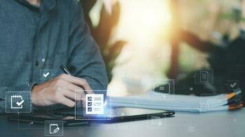 Accountant showing office document auditing concept ,plan review process and assess correctness ,Management of important document storage of organization ,document system ,accountant Audit documents photo