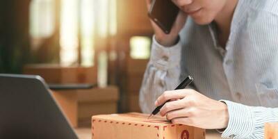 concept of selling products online ,order management in online stores, shopping on the internet ,Selling online on the Internet ,Write shipping address from customer ,order in online store ,SME photo