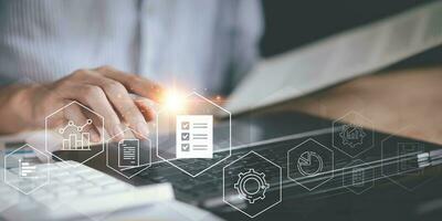 Accountant showing office document auditing concept ,plan review process and assess correctness ,Management of important document storage of organization ,document system ,accountant Audit documents photo