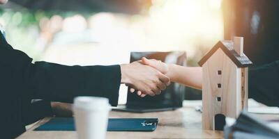 Businessmen shaking hands to indicate a business deal,successful contract management of the company,signing an agreement,business partner,New opportunities for the future of the industry,joint venture photo