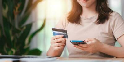 Online payment concept with credit card and smartphone ,online banking service ,internet payment ,Money transfer and service fee payment ,financial transactions with application ,e-commerce photo