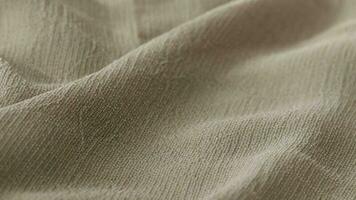 Beige soft sackcloth - background. Closeup video