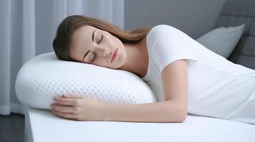The concept of insomnia. A woman sleeps in pajamas on a white pillow. . photo