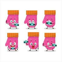 Photographer profession emoticon with pink gloves cartoon character vector