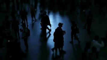 Crowds of people commuting in the city crossing street in rush hour traffic video