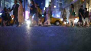 Crowds of people commuting in the city crossing street in rush hour traffic video