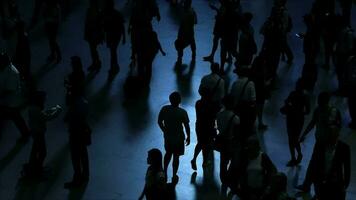 Crowds of people commuting in the city crossing street in rush hour traffic video