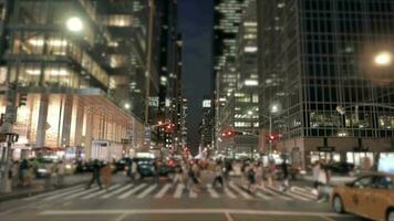 Crowds of people commuting in the city crossing street in rush hour traffic video