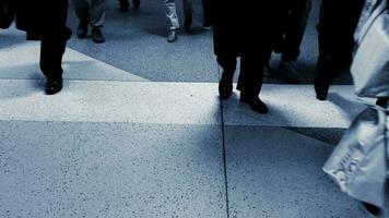 Pedestrians walking on crowded urban street commuting to work video