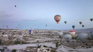 Cappadocia, Turkey - October 30, 2022, Balloons Take Off At Dawn Over Cappadocia, Aerial View video