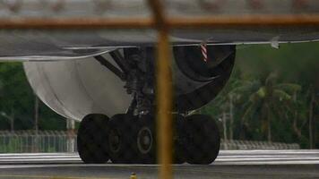 Wheels rubber tire rear landing gear racks airplane aircraft, under wing view video