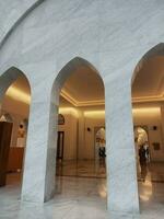 sheikh zayed mosque entrance white color photo