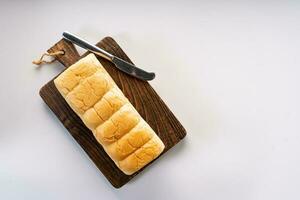 Fresh Baked brioche soft and fluffy bun white Bread or milk bread. isolated white background photo