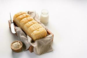 Fresh Baked brioche soft and fluffy bun white Bread or milk bread. isolated white background photo