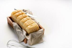 Fresh Baked brioche soft and fluffy bun white Bread or milk bread. isolated white background photo