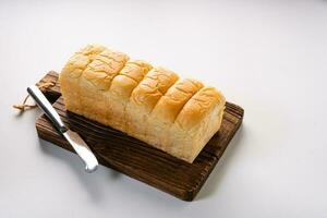 Fresh Baked brioche soft and fluffy bun white Bread or milk bread. isolated white background photo