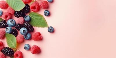 many kind of berry arranged in pastel background with copy space photo