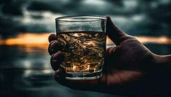 Hand holding whiskey glass, close up at bar generated by AI photo