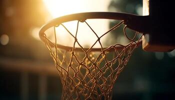 Basketball ball thrown through metal hoop at sunset generated by AI photo