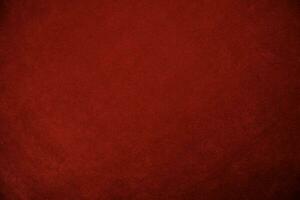 Red velvet fabric texture used as background. red fabric background of soft and smooth textile material. There is space for text.. photo