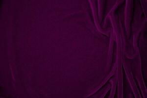 pink velvet fabric texture used as background. Wine color panne fabric background of soft and smooth textile material. crushed velvet .luxury magenta tone for silk. photo