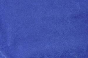 blue velvet fabric texture used as background. blue fabric background of soft and smooth textile material. There is space for text. photo