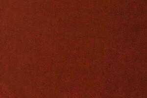 Red velvet fabric texture used as background. red fabric background of soft and smooth textile material. There is space for text. photo