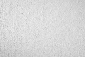 Surface of the White stone texture rough, gray-white tone. Use this for wallpaper or background image. There is a blank space for text cement wall. photo