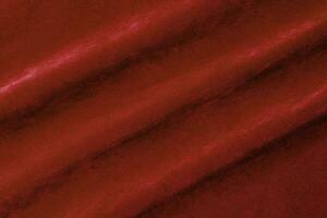 Red velvet fabric texture used as background. red fabric background of soft and smooth textile material. There is space for text. photo