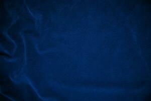 Blue velvet fabric texture used as background. blue fabric background of soft and smooth textile material. There is space for text. photo