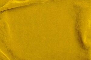 Yellow velvet fabric texture used as background. violet fabric background of soft and smooth textile material. There is space for text. photo