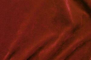 Red velvet fabric texture used as background. red fabric background of soft and smooth textile material. There is space for text. photo