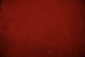 Red velvet fabric texture used as background. red fabric background of soft and smooth textile material. There is space for text.. photo