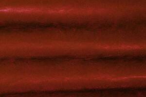 Red velvet fabric texture used as background. red fabric background of soft and smooth textile material. There is space for text. photo
