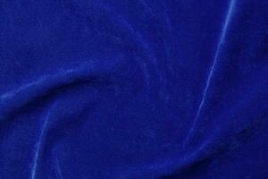 blue velvet fabric texture used as background. blue fabric background of soft and smooth textile material. There is space for text. photo