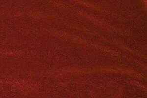 Red velvet fabric texture used as background. red fabric background of soft and smooth textile material. There is space for text. photo
