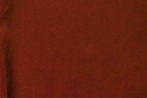 Red velvet fabric texture used as background. red fabric background of soft and smooth textile material. There is space for text. photo