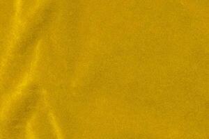 Yellow velvet fabric texture used as background. violet fabric background of soft and smooth textile material. There is space for text. photo