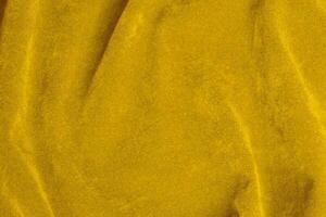 Yellow velvet fabric texture used as background. violet fabric background of soft and smooth textile material. There is space for text. photo