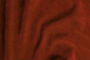 Red velvet fabric texture used as background. red fabric background of soft and smooth textile material. There is space for text. photo