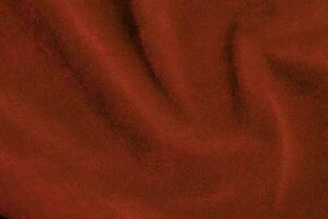 Red velvet fabric texture used as background. red fabric background of soft and smooth textile material. There is space for text. photo