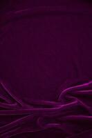 pink velvet fabric texture used as background. Wine color panne fabric background of soft and smooth textile material. crushed velvet .luxury magenta tone for silk. photo