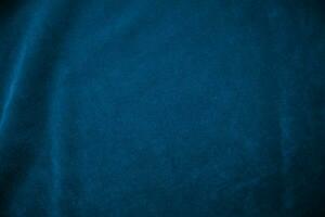 Blue velvet fabric texture used as background. blue fabric background of soft and smooth textile material. There is space for text. photo