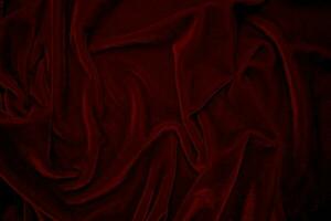 Red velvet fabric texture used as background. red panne fabric background of soft and smooth textile material. crushed velvet .luxury scarlet for silk. photo