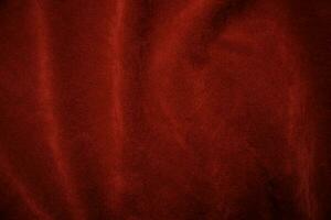 Red velvet fabric texture used as background. red fabric background of soft and smooth textile material. There is space for text.. photo