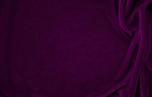 pink velvet fabric texture used as background. Wine color panne fabric background of soft and smooth textile material. crushed velvet .luxury magenta tone for silk. photo